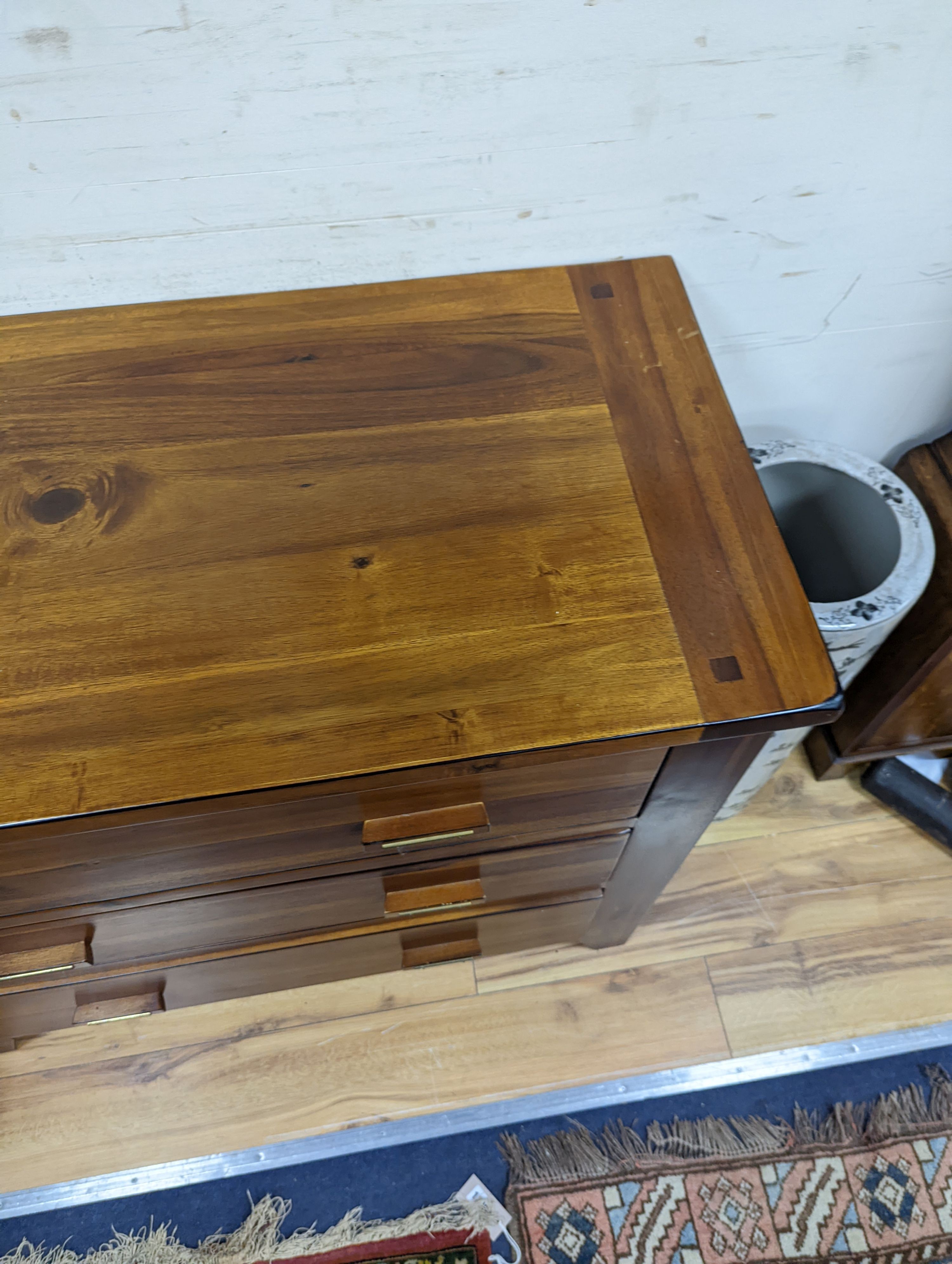 A modern hardwood three drawer chest, width 95cm, height 85cm